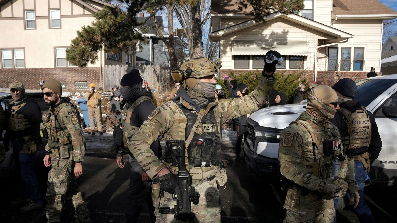 Hundreds more officers heading to Minnesota – as state sues Trump administration to block ICE agent surge